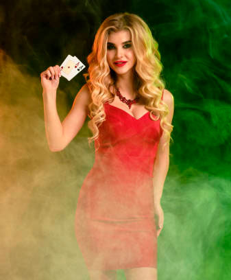 Girl in red with cards in a hookah bar.